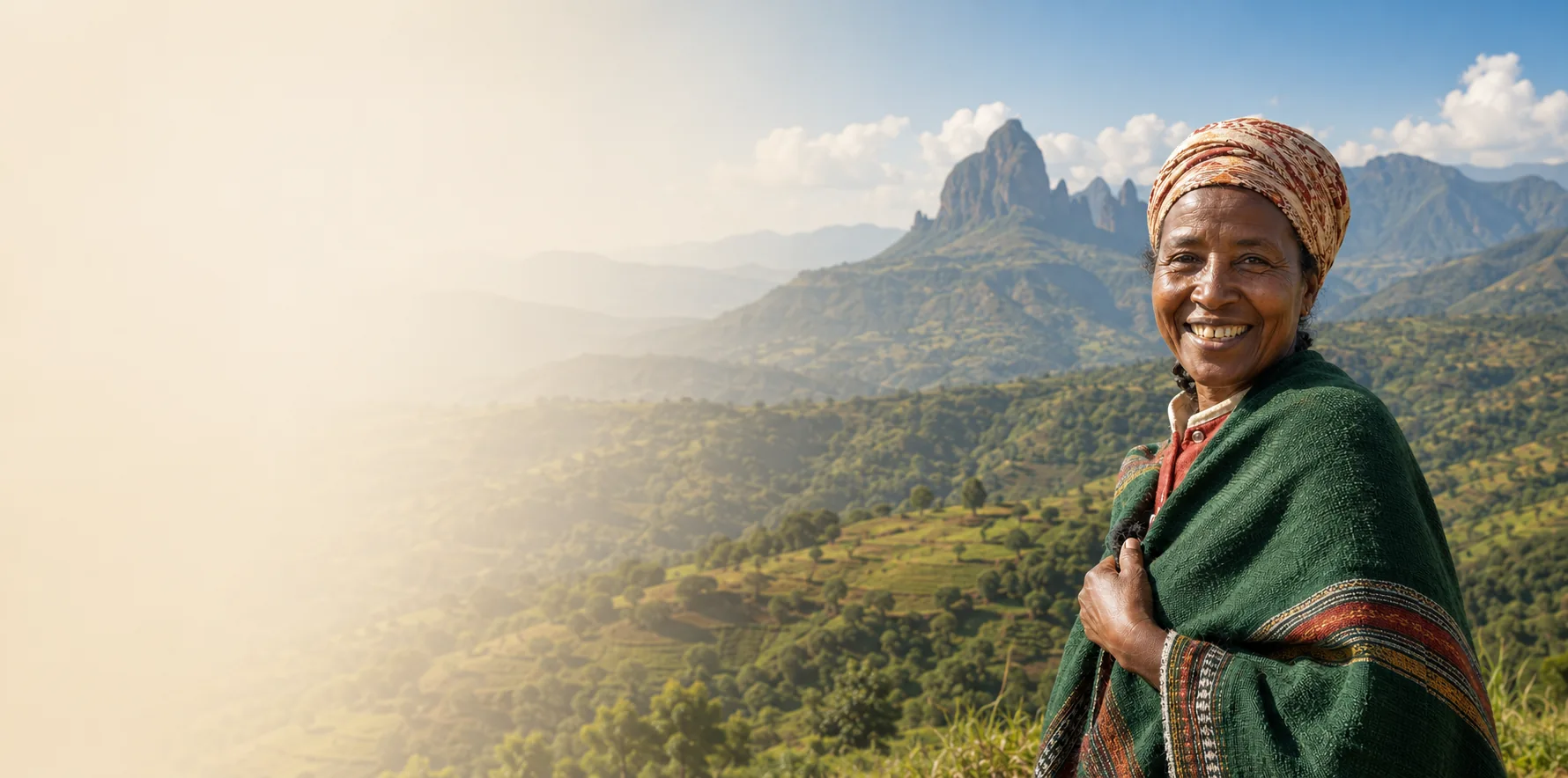 A smiling Ethiopian woman in a traditional shawl in the highlands