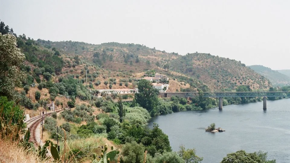 Green highland hills above a winding river